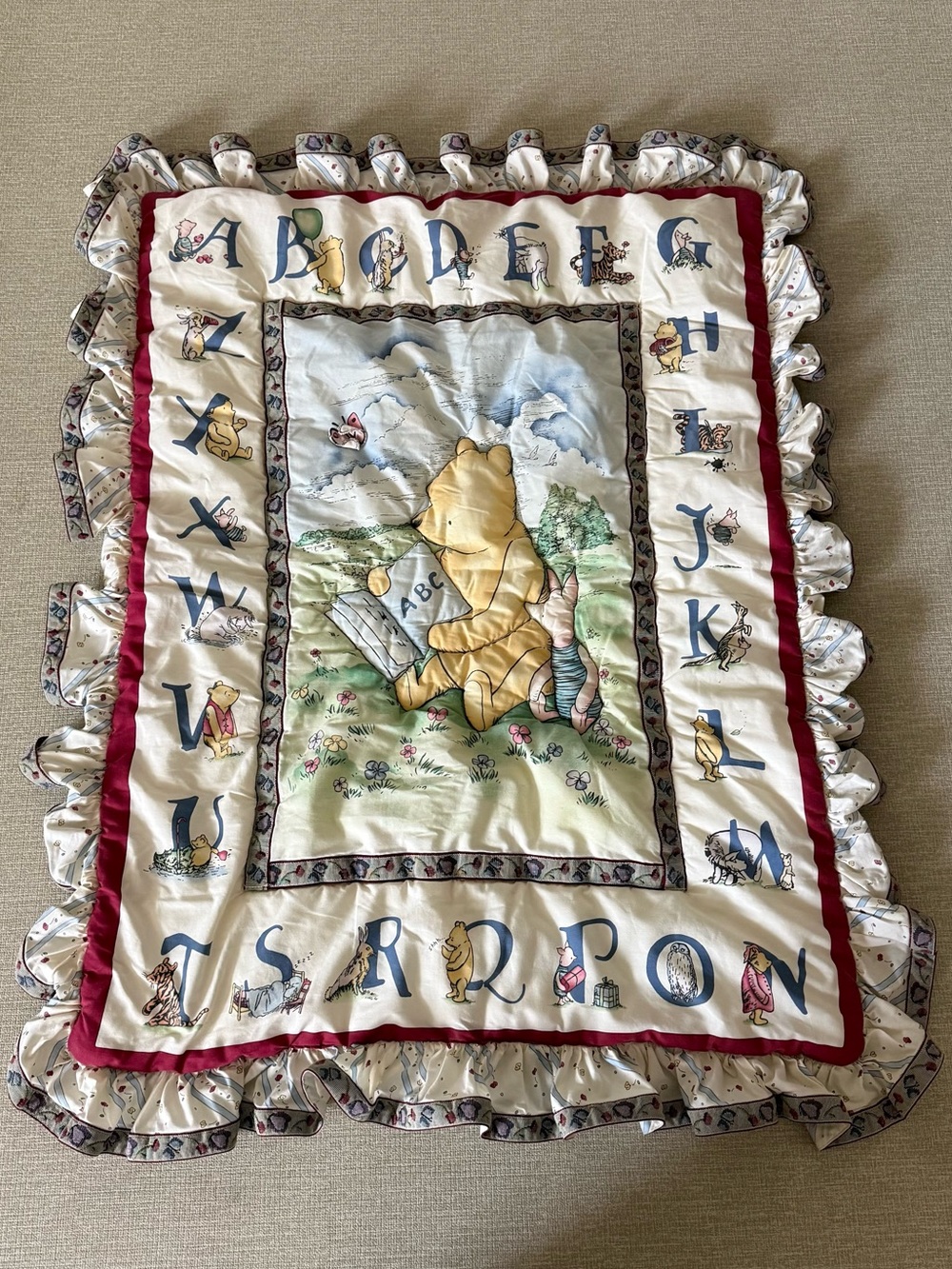 Classic vintageDisney Winnie the Pooh Cream, Gold, Blue & Red Ruffled Baby quilt